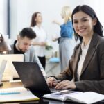 medium-shot-woman-working-laptop